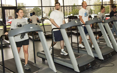 Photo of people exercising on Rec Center treadmills