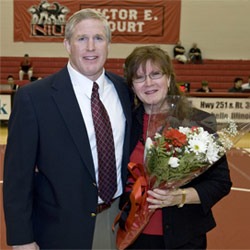 Coach Dave Grant (with his wife, Kris) was honored before the meet.