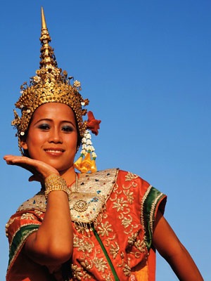 A photo of a woman in traditional Thai clothing