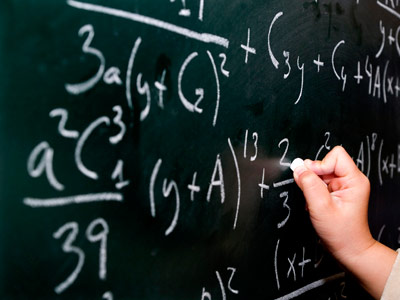 Photo of a math equation on chalkboard