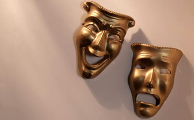 Photo of comedy and tragedy masks