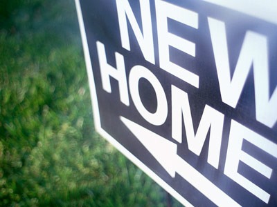 Photo of a "New Home" sign