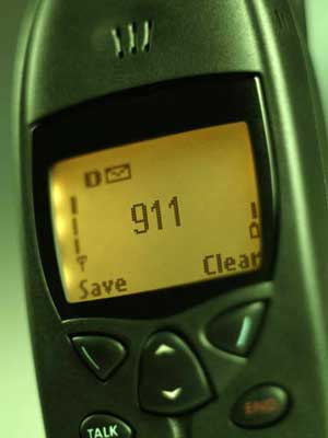Photo of a cell phone dialing 911