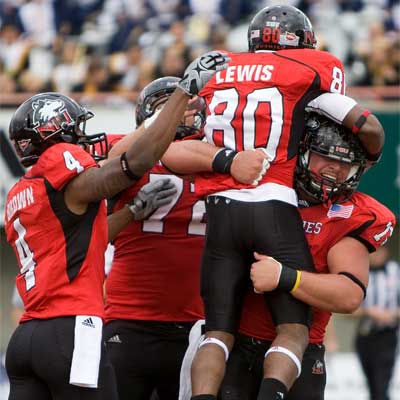 Tommylee Lewis celebrates a touchdown Saturday vs. Cal Poly.