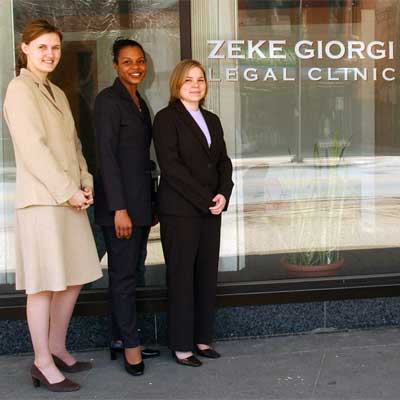 NIU College of Law students stand outside the doors of the Zeke Giorgi Legal Clinic in downtown Rockford.