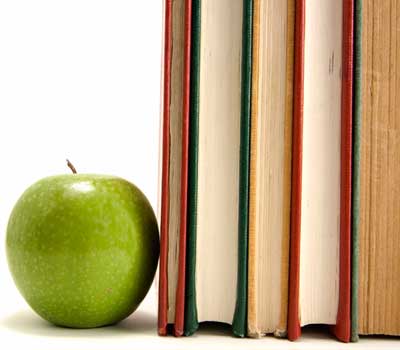 Photo of an apple used as a bookend