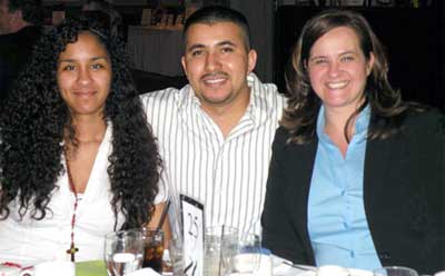 NIU alumna Yolanda (right) enjoys a MELD banquet with her husband, Usvaldo, and her oldest daughter, Alejandra. Photo courtesy Rockford MELD.