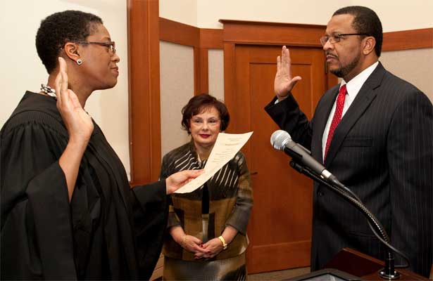 NIU Board of Trustees Chair Cherilyn G. Murer observes Wheeler G. Coleman's oath of office Thursday, Feb. 2
