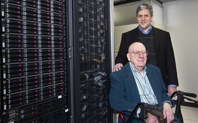 Clyde Kimball (front) and Nicholas Karonis with NIU’s new computer cluster.
