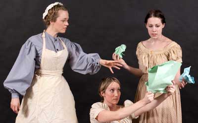 Charlotte Fox, Kaitlin Henderson and Amy Powell rehearse a scene from “Mrs. Packard.”