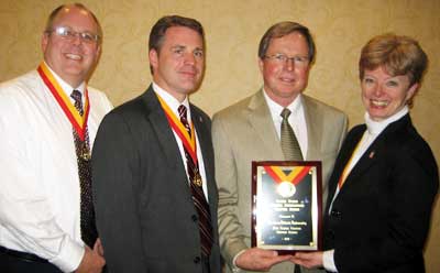 NIU received the Eileen Evans Overall Outstanding Chapter Award, signifying the strongest contributions to international education by a Phi Beta Delta Chapter over the preceding year. From left: J.D. Bowers; Christopher M. Jones, past president of Zeta Gamma Chapter; International President Richard Deming; and Deborah Pierce, chapter coordinator.