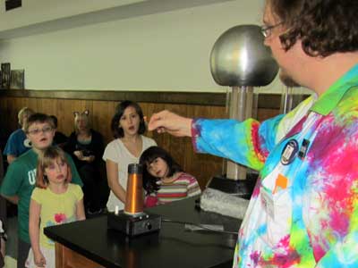 STEM Outreach associate Jeremy Benson demonstrates a Tesla Coil at DeKalb Public Library’s Bright Futures Kick Off Party.
