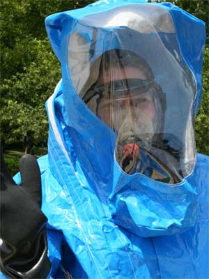 Briana O'Halleran learns to use self-contained breathing apparatus and protective suit.
