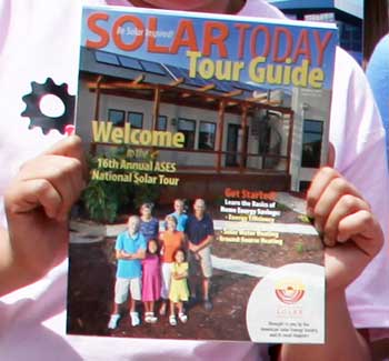 Photo of an Enhancing Engineering Pathways student holding a Solar Today magazine