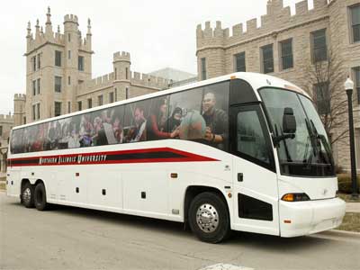 Photo of an NIU bus parked outside Altgled Hall