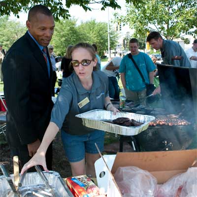 John Jones, associate vice president for Student Affairs, and Megan Gerken, an academic adviser in the Department of Literacy Education, enjoy a Meet the Vets Barbecue courtesy of Military Student Services.