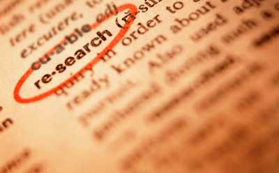 Photo of the word "research" circled in the dictionary
