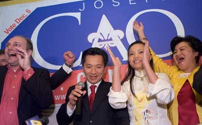 Anh “Joseph” Cao, center, celebrates his election in 2008. (New Orleans Times-Picayune photo)