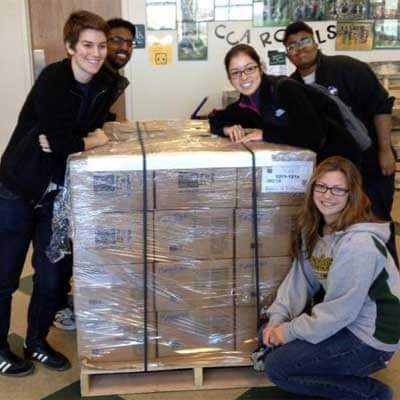 NIU students packed 3,000 pounds of food that would provide 2,307 meals to families around northern Illinois last year.