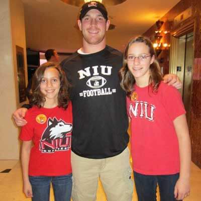 NIU Huskie fans Mindy (left) and Brianna Kramer meet quarterback Jordan Lynch.