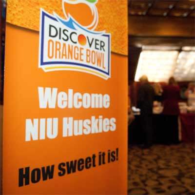 Photo of a sign welcoming NIU Huskie fans to Miami.
