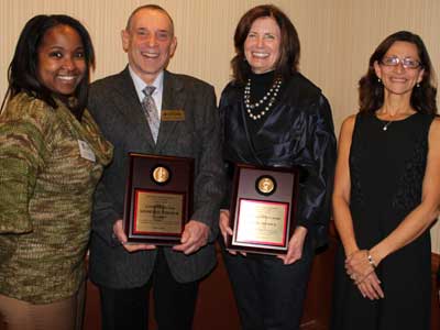 Kenneth and Ellen Chessick receive awards from the NIU College of Law. With them are Kenya Jenkins-Wright, left, president of the college's Alumni Council, and Dean Jennifer Rosato, right.