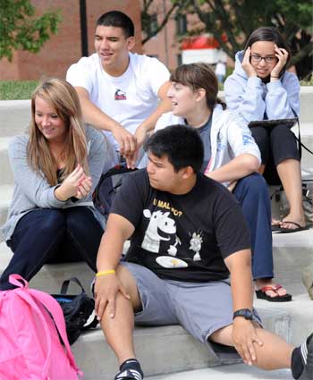 NIU students enjoy a fall day on campus.