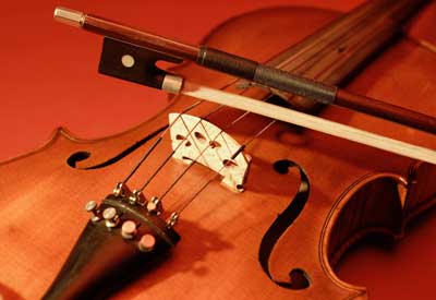 Photo of a violin and bow