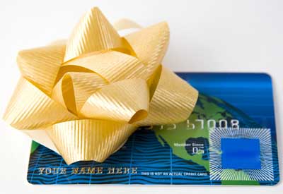 Photo of a credit card with a golden gift bow