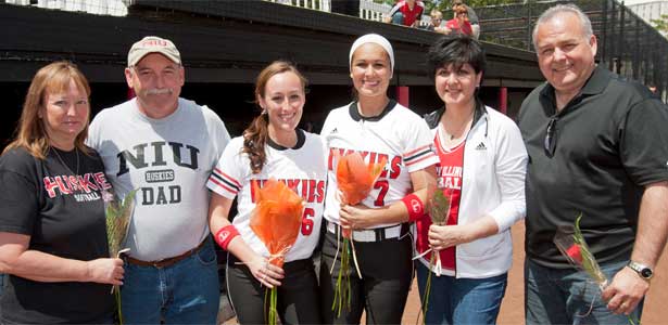Seniors Bryanna Phelan (third from left) and Amanda Sheppard (third from right) celebrate with their parents.