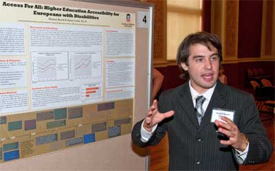 NIU history major Thomas Bouril, part of the Summer Research Opportunities Program, presents his research on access to higher education for Europeans with disabilities.