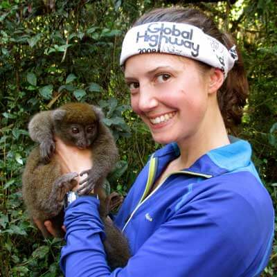 Molly Fitzpatrick with a gray bamboo lemur.