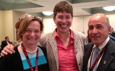 Lt. Gov. Sheila Simon is flanked by NIU’s Anne Birberick and Jerry Montagat the Scaling Up conference in Bloomington, Ill.