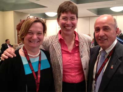 Lt. Gov. Sheila Simon is flanked by NIU’s Anne Birberick and Jerry Montag at the Scaling Up conference in Bloomington, Ill.