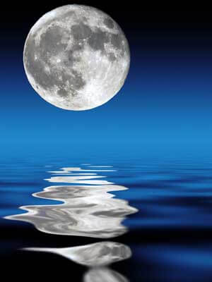 Photo of a full moon over water and its reflection