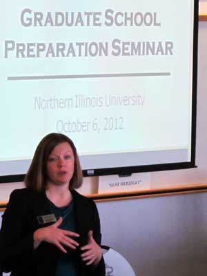 Julia Spears speaks with prospective graduate students.
