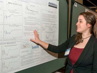 Ellen Raimondi looks over her research poster during the annual meeting of the American Association for the Advancement of Science.