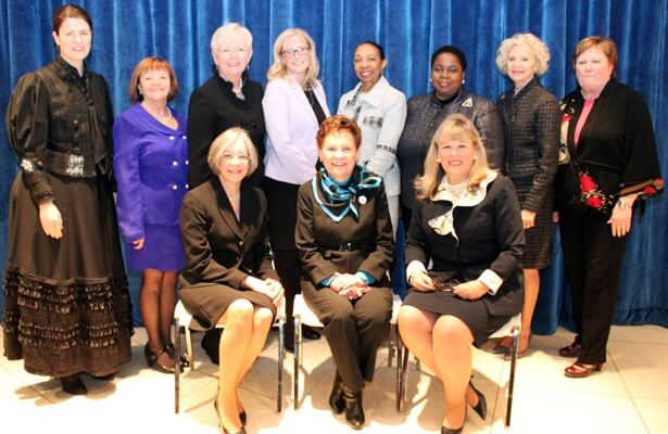 Standing (from left): Attorney Rachel Morse, Attorney Mary Petruchius (Committee Chair, ISBA Women and the Law), Justice Mary Jane W. Theis, attorney Jennifer K. Gust; Justice Joy V. Cunningham, Justice Shelvin Louise Marie Hall, Justice Anne M. Burke, and Justice Susan F. Hutchinson. Seated (from left): Chief Judge Diane P. Wood, Chief Justice Rita B. Garman, and ISBA President Paula Holderman.
