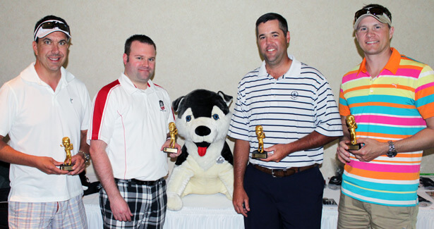 The winning foursome at the 2014 NIU Law Golf Outing included (from left): Jason Hiland, president/CEO of HurricaneGolf.com and Diamond Tour Golf; Alumni Council member Riley Oncken (’04), Riley N. Oncken, P.C.; Grant Goltz, vice president at National Bank and Trust Co.; and Dr. Jason Friedrichs, CGH Medical Center.