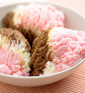 Photo of a bowl of neapolitan ice cream