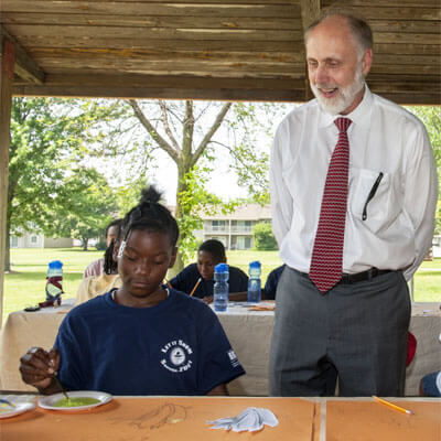 NIU President Doug Baker visits Camp Power in July 2014.