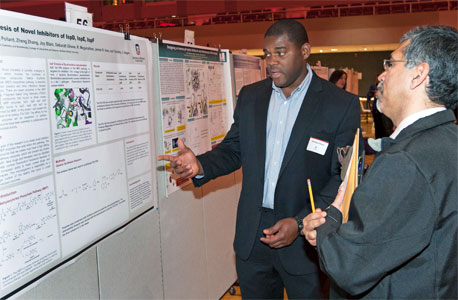 Sophomore chemistry major Sterling Pollard presents his “Fragment Based Drug Discovery Analog Activity with respect to the MEP Pathway” project during the 2014 URAD.