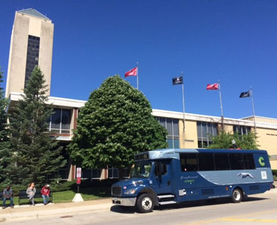 Greyhound bus at Holmes Student Center