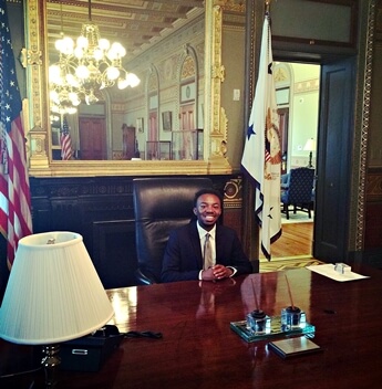 Randiss Hopkins takes a seat at the conference table in the Vice President's Ceremonial Office during his visit the White House on August 4.