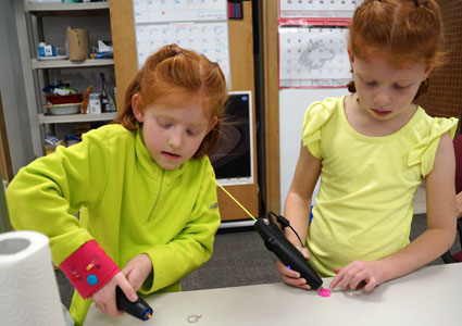 STEM Divas use 3Doodlers, a hand-held technology similar to that of 3D printers, to create their own jewelry. 