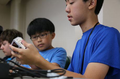 Students from Dongguan Taiwanese Business school were among the more than 300 campers who attended STEM Outreach summer camps in 2015.