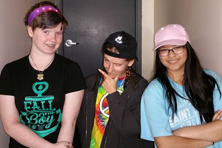 Participants from STEM Outreach’s summer camps show off their wearable electronic projects.