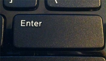 Photo of an "Enter" button on a computer keyboard