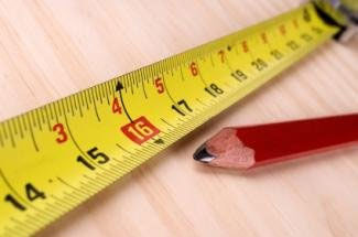 Photo of a pencil and tape measure