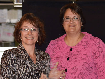 Nancy Hanlon Harrison (left) and Econ IL Governing Board Chair Pamela C. Piarowski